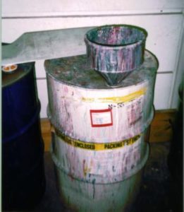 Open hazardous waste container with funnel