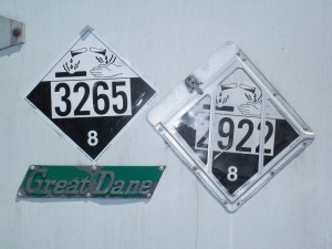 hazard class 8 corrosive placards UN3265 and UN2922