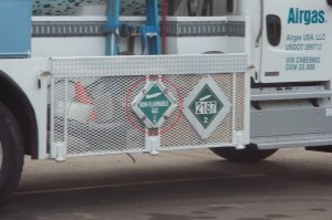 Placards identify the hazard class and division of the HazMat