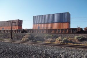 Freight containers loaded on rail car