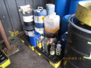Improper storage of hazardous waste containers