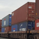 Freight containers of HazMat on railcars