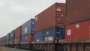 Freight containers of HazMat on railcars