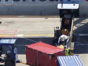 Unload Baggage from Passenger Aircraft